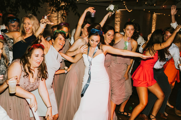 wedding guests dancing at the reception
