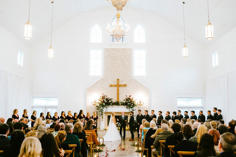 wedding ceremony in a large white building
