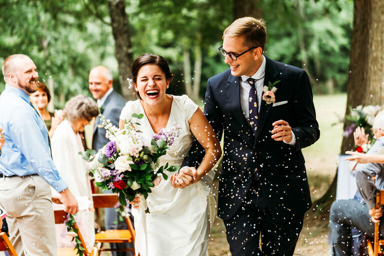 bride and groom walking down the aisle