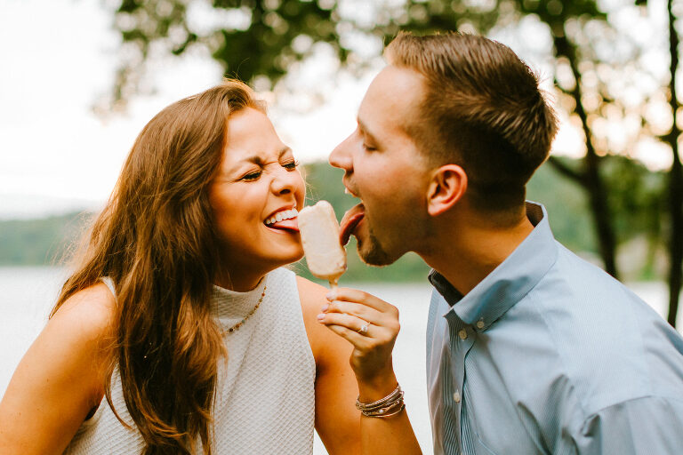 engaged couple eating ice cream together